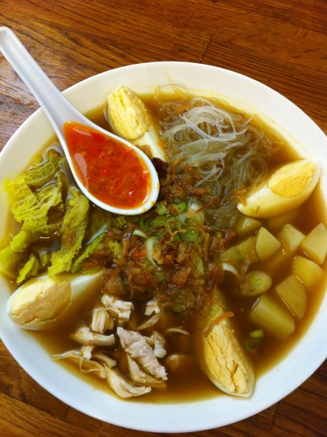 Soto ayam - chicken, mung bean noodles, boiled eggs, potatoes and cabbage with spiced broth.